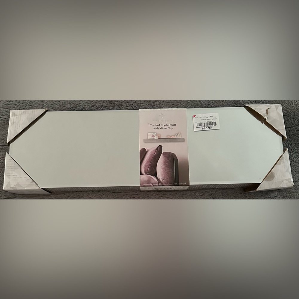 Crystal Shelf with mirror top.